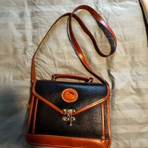 Dooney & Bourke Black and Tan Pebbled Leather Top-Handle Crossbody